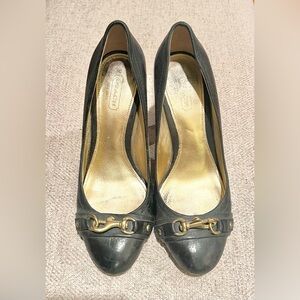 Classic high heel by Coach.